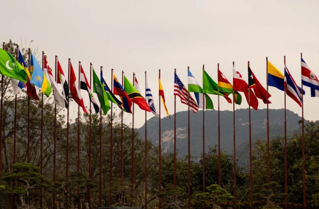 Climate funding plan 2026 showing world leaders discussing renewable energy investments and global climate agreements