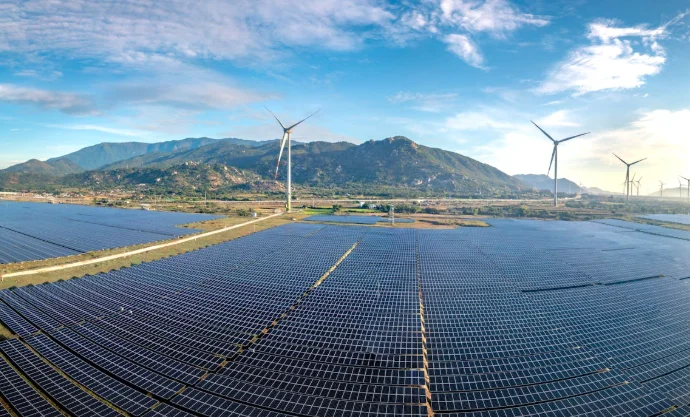Renewable energy investments 2026 showing solar panels, wind turbines, and global clean energy infrastructure projects