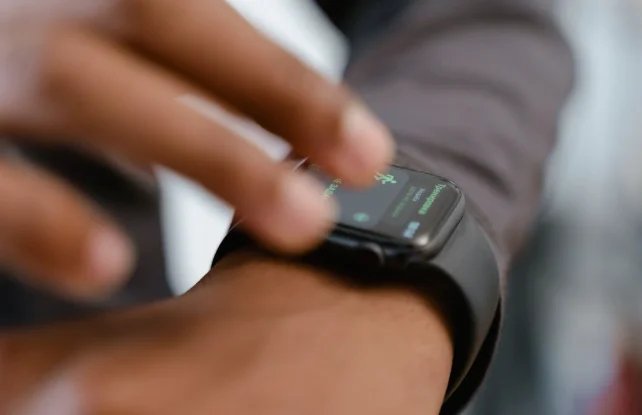 Wearable health technology 2026 showing smart fitness devices, health tracking wearables, heart monitoring systems, and digital healthcare technology
